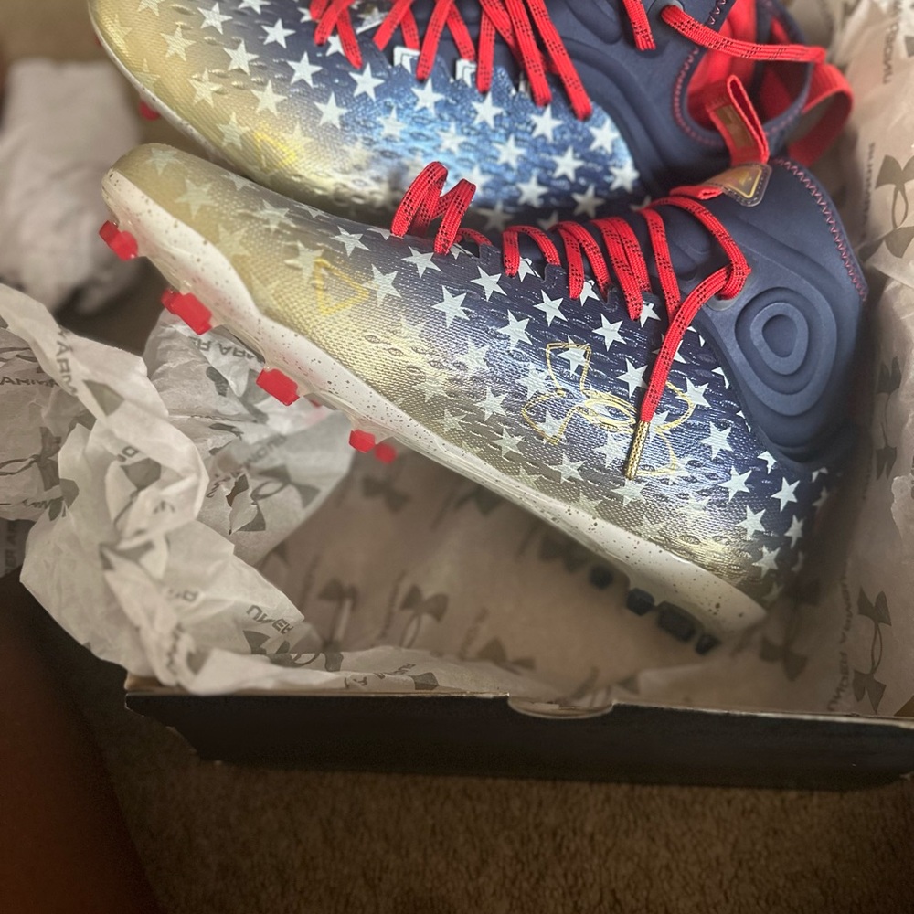 Under Armour Blue and Gold Star Cleats